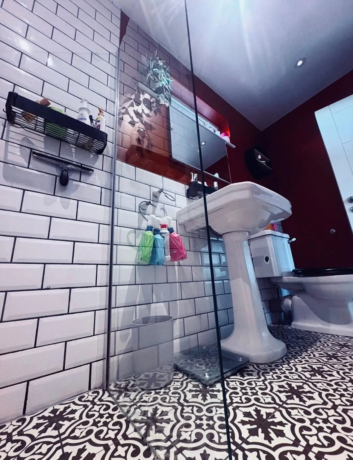 Freshly cleaned bathroom sink and fittings
