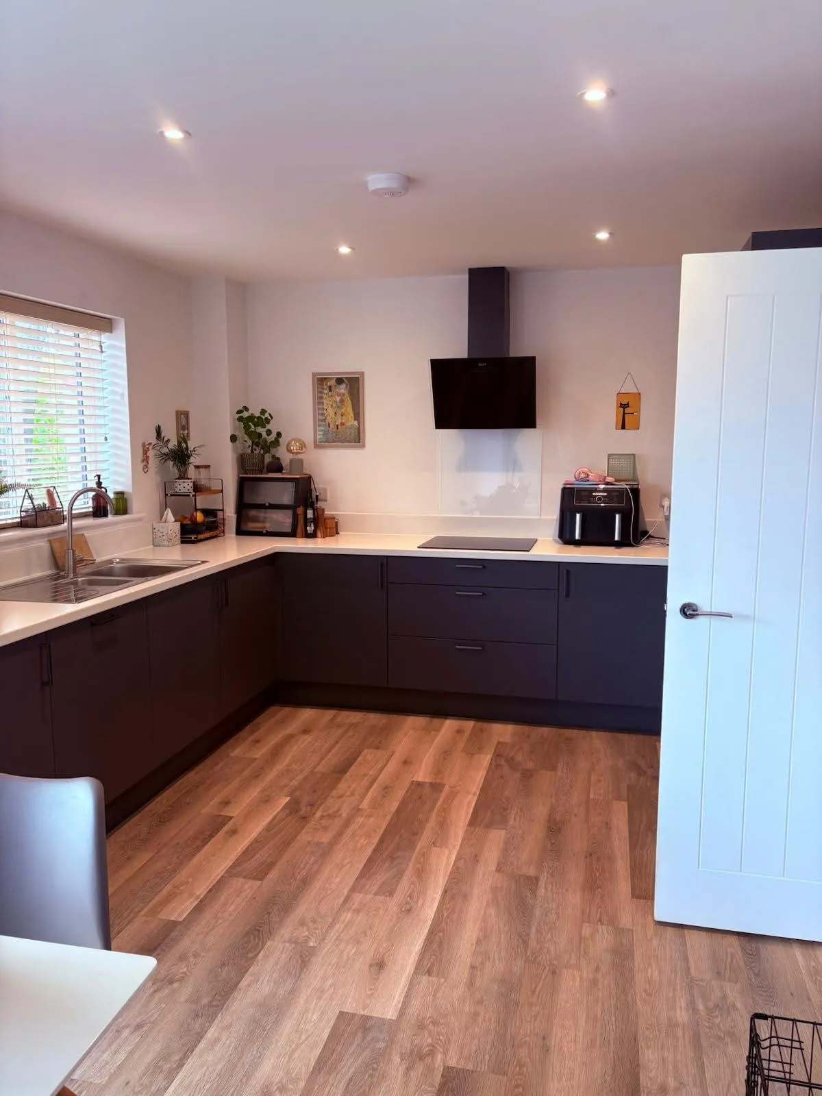 A bright, spotless open-plan kitchen after a clean by The Little Cleaning Company